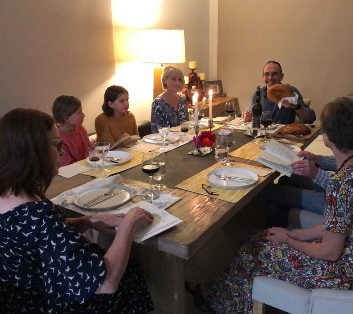 Derech HaMashiach community members together eating a meal